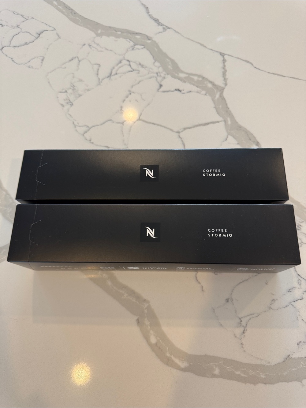 Nespresso Stormio Vertuo pods.  2 boxes